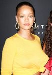 Rihanna flashes bare boobs