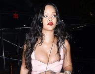 Rihanna flashes bare boobs