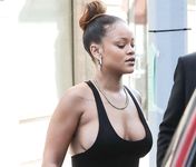 Rihanna flashes bare boobs