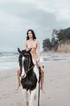 Kendall Jenner naked riding a horse