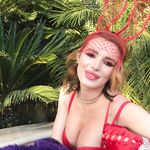 Bella Thorne strips topless and goes nude