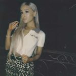 Ariana Grande goes nude and topless
