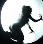 Ariana Grande goes nude and topless