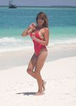 Lizzie Cundy looks incredible in Bikini at a Beach