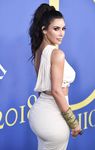 Kim Kardashian wears a see thru dress