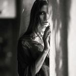 Rebecca Bagnol with two naked models