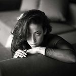 Rebecca Bagnol with two naked models