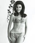 Linda Harrison shows irresistible nude boobs and sexy legs