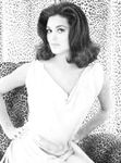 Linda Harrison shows irresistible nude boobs and sexy legs