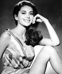 Linda Harrison shows irresistible nude boobs and sexy legs
