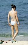 Evangeline Lilly on the beach in bikini Photo