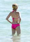 Emma Roberts on the beach in bikini