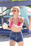 Emma Roberts on the beach in bikini