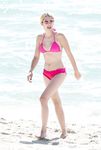 Emma Roberts on the beach in bikini