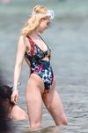 Nicola Peltz in a wet swimsuit