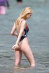 Nicola Peltz in a wet swimsuit
