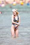 Nicola Peltz in a wet swimsuit