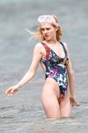Nicola Peltz in a wet swimsuit
