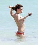 Katie Cassidy in a wet swimsuit