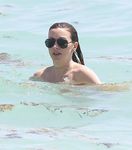 Katie Cassidy in a wet swimsuit