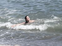 Sophia Bush in a wet swimsuit