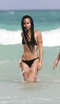 Zoë Kravitz in a wet swimsuit