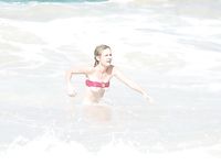 Kirsten Dunst in a wet swimsuit