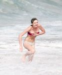 Kirsten Dunst in a wet swimsuit