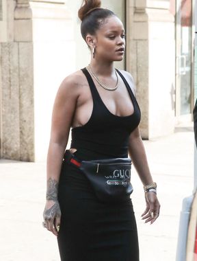 Rihanna flashes bare boobs