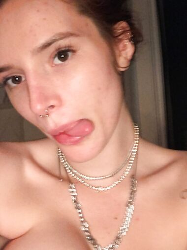 Bella Thorne strips topless and goes nude