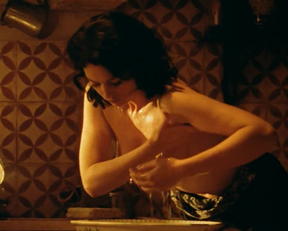 Monica Bellucci naked - Squeezing Some Lemons