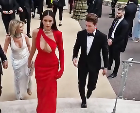 Nina Dobrev naked - Ample cleavage in peekaboo scarlet dress (2022)